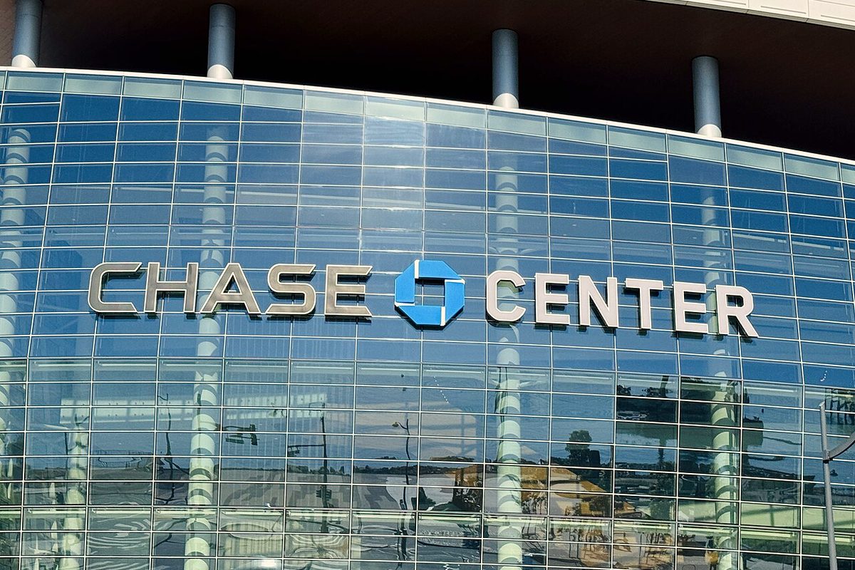 Glass facade and sign of Chase Center in San Francisco's Mission Bay