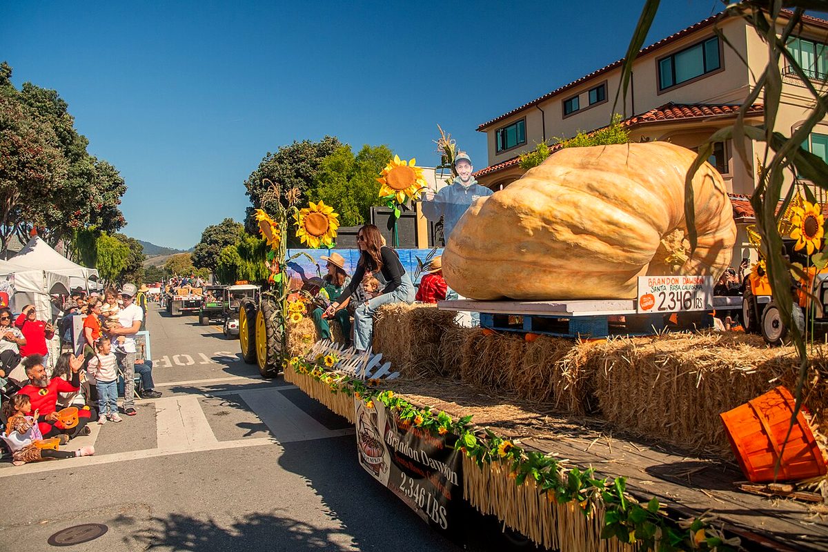 Giant pumpkins on parade floats at the Half Moon Bay Art & Pumpkin Festival's Great Pumpkin Parade