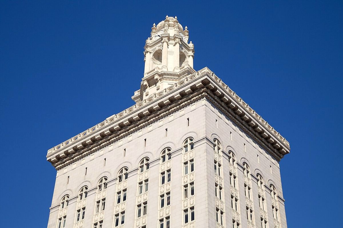 Tower of Oakland City Hall against a blue sky